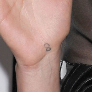 Kristen Stewart’s faded and wonky symbol.